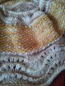 Ripples, waves and a mix of yellow in moss stitch.